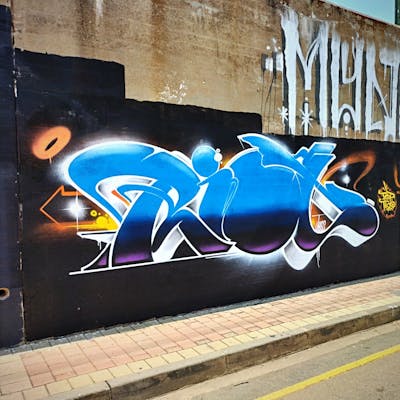 Light Blue and Colorful Stylewriting by Riot and Top2. This Graffiti is located in Johannesburg, South Africa and was created in 2023.
