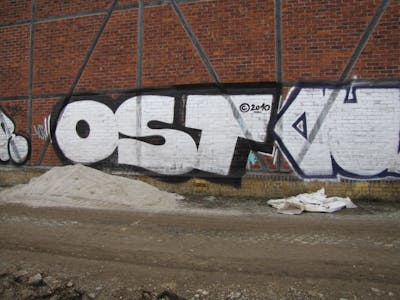 Chrome Stylewriting by urine, Pizar and Mobar OST. This Graffiti is located in Leipzig, Germany and was created in 2010.