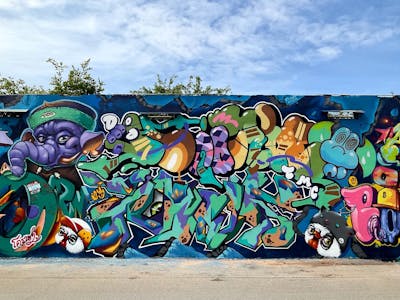 Colorful and Cyan Stylewriting by Hootive, ear17, BNK52, Leo, kanaet and asin. This Graffiti is located in Thailand and was created in 2023. This Graffiti can be described as Stylewriting, Characters and Streetart.