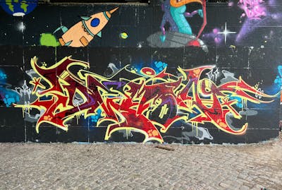 Red and Yellow Stylewriting by SmakOne. This Graffiti is located in hanover, Germany and was created in 2022. This Graffiti can be described as Stylewriting and Wall of Fame.
