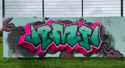 Cyan and Coralle Stylewriting by HAMPI. This Graffiti is located in MÜNSTER, Germany and was created in 2023. This Graffiti can be described as Stylewriting and Wall of Fame.