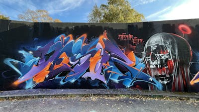 Blue and Colorful Characters by Desur, AIDN and new. This Graffiti is located in Hamburg, Germany and was created in 2021. This Graffiti can be described as Characters, Stylewriting and Wall of Fame.