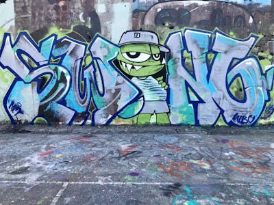 Light Green and Blue and Violet Characters by MCT, WBC and Swing. This Graffiti is located in Lyon, France and was created in 2023. This Graffiti can be described as Characters, Stylewriting and Wall of Fame.
