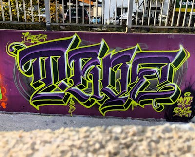 Violet and Yellow Stylewriting by TROZ ONE. This Graffiti is located in Innsbruck, Austria and was created in 2022. This Graffiti can be described as Stylewriting and Wall of Fame.