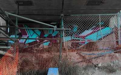 Cyan and Colorful Stylewriting by Decoi. This Graffiti is located in Queenstown, New Zealand and was created in 2022. This Graffiti can be described as Stylewriting and Abandoned.