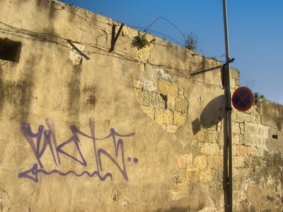 Violet Handstyles by Riots. This Graffiti is located in Malta and was created in 2011.