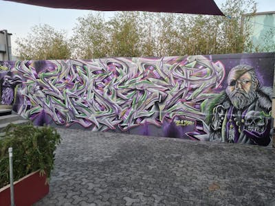 Grey and Violet Stylewriting by Eostone. This Graffiti is located in Zürich, Switzerland and was created in 2021. This Graffiti can be described as Stylewriting, Characters and Streetart.