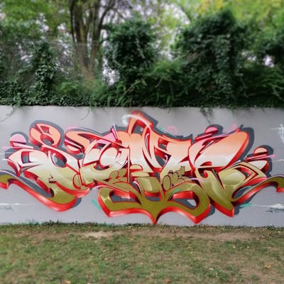 Red and Colorful Stylewriting by Someone and Atelier wandART. This Graffiti is located in Basel, Switzerland and was created in 2022. This Graffiti can be described as Stylewriting and Wall of Fame.
