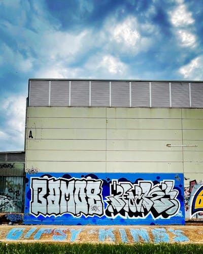 Chrome and Blue and Black Stylewriting by Bamos and hock. This Graffiti is located in Valencia, Spain and was created in 2022. This Graffiti can be described as Stylewriting and Abandoned.