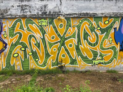 Green and Orange Stylewriting by M3C and Sakey. This Graffiti is located in Jambi City, Indonesia and was created in 2022.