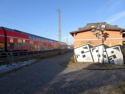 Chrome and Black Stylewriting by 689, 689ers, BM45 and BGS. This Graffiti is located in coswig, Germany and was created in 2022. This Graffiti can be described as Stylewriting, Trains and Street Bombing.