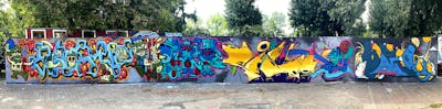 Colorful Stylewriting by Hülpman, Egosoup, OST, CCS, RWRZ, TDZ, PÜTK, Filou and Hacca. This Graffiti is located in Potsdam, Germany and was created in 2023. This Graffiti can be described as Stylewriting, Characters and Wall of Fame.