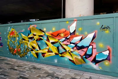 Colorful and Yellow Stylewriting by SIDOK. This Graffiti is located in London, United Kingdom and was created in 2021. This Graffiti can be described as Stylewriting and Futuristic.