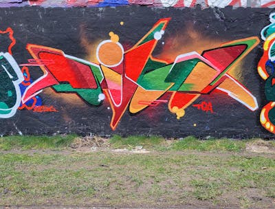Red and Green Stylewriting by Dirt. This Graffiti is located in Leipzig, Germany and was created in 2023. This Graffiti can be described as Stylewriting and Wall of Fame.