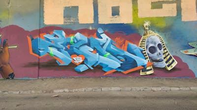 Light Blue Stylewriting by DCK, Zoid, Elmo and ALL CAPS COLLECTIVE. This Graffiti is located in Hungary and was created in 2020. This Graffiti can be described as Stylewriting, Characters, 3D and Wall of Fame.