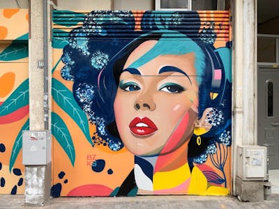 Colorful Characters by bzks. This Graffiti is located in Thessaloniki, Greece and was created in 2023. This Graffiti can be described as Characters, Streetart and Commission.