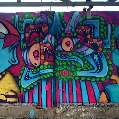 Colorful and Cyan Characters by Rafia.exp. This Graffiti is located in Depok, Indonesia and was created in 2024. This Graffiti can be described as Characters and Streetart.