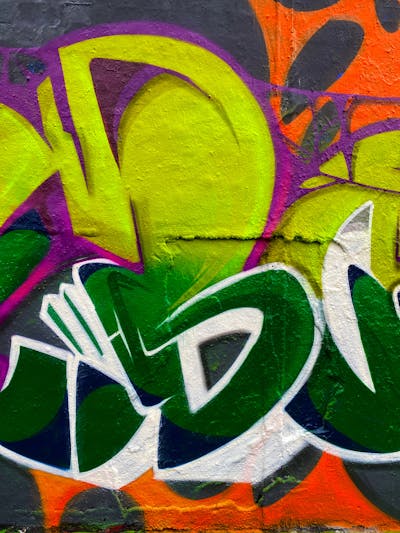 Colorful and Light Green Stylewriting by Jibo and MDS. This Graffiti is located in Düsseldorf, Germany and was created in 2023. This Graffiti can be described as Stylewriting and Wall of Fame.