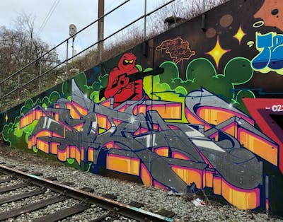 Chrome and Colorful Stylewriting by Soten. This Graffiti was created in 2021 but its location is unknown. This Graffiti can be described as Stylewriting and Characters.