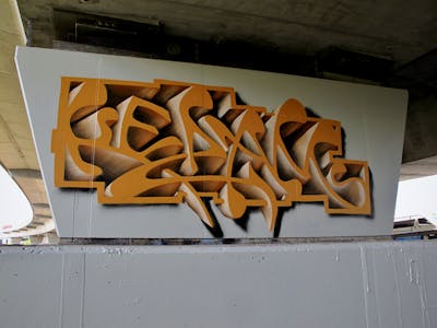Orange Stylewriting by Kezam. This Graffiti is located in Auckland, New Zealand and was created in 2022. This Graffiti can be described as Stylewriting and 3D.