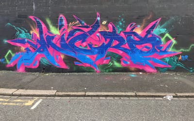 Blue and Coralle Stylewriting by Micro79. This Graffiti is located in United Kingdom and was created in 2021. This Graffiti can be described as Stylewriting and Wall of Fame.