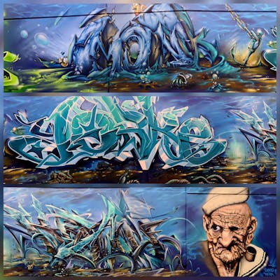Cyan and Blue Stylewriting by MONK, CUORE, YORKE and KEAM. This Graffiti is located in Karlstein am Main, Germany and was created in 2022. This Graffiti can be described as Stylewriting, Characters and Wall of Fame.