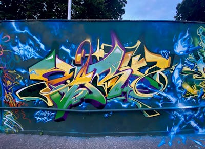 Colorful Stylewriting by Zark. This Graffiti is located in Locate Triulzi, Italy and was created in 2023. This Graffiti can be described as Stylewriting and Wall of Fame.