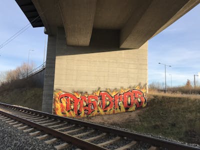 Red and Yellow Stylewriting by bros, rizok, R120K, RADICALS and RCS. This Graffiti is located in Leipzig, Germany and was created in 2021. This Graffiti can be described as Stylewriting and Line Bombing.