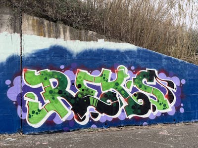 Green and Light Green and Violet Stylewriting by REKS. This Graffiti is located in Ascoli Piceno, Italy and was created in 2024.