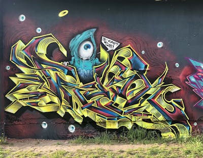 Colorful Characters by Fresk. This Graffiti is located in Poznan, Poland and was created in 2022. This Graffiti can be described as Characters and Stylewriting.