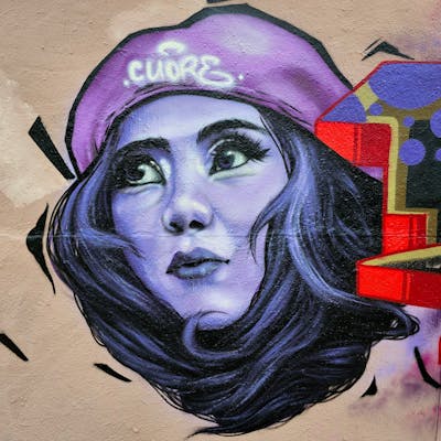 Violet Characters by CUORE. This Graffiti is located in Berlin, Germany and was created in 2024. This Graffiti can be described as Characters and Streetart.