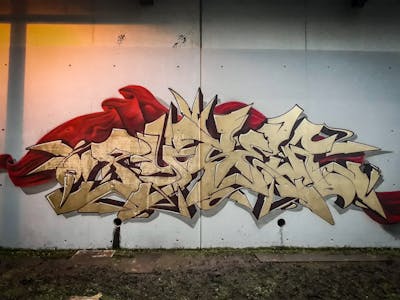 Gold and Red Stylewriting by Pyser. This Graffiti is located in Munich, Germany and was created in 2020. This Graffiti can be described as Stylewriting, Characters and Abandoned.