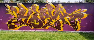 Brown and Yellow and Violet Stylewriting by Hopek, UKF and JBC. This Graffiti is located in Poland and was created in 2023.