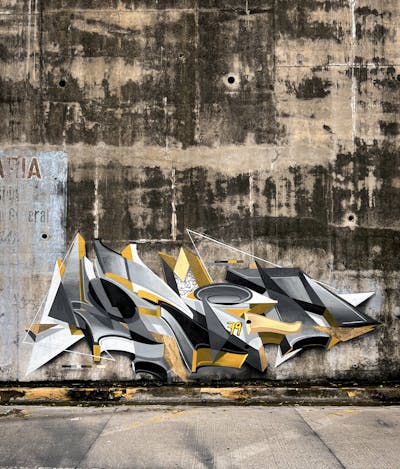 Beige and Grey Stylewriting by Kormed 79. This Graffiti is located in Lourdes Colón, El Salvador and was created in 2024. This Graffiti can be described as Stylewriting and Abandoned.