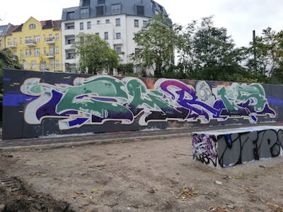 Light Green and Violet and White Stylewriting by Chr15. This Graffiti is located in Berlin, Germany and was created in 2023. This Graffiti can be described as Stylewriting, Characters and Wall of Fame.