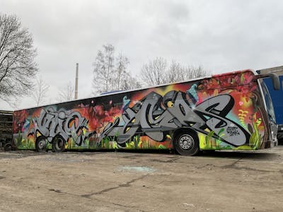 Grey and Colorful Cars by Hmas and UNIQ. This Graffiti is located in Chemnitz, Germany and was created in 2022. This Graffiti can be described as Cars and Stylewriting.