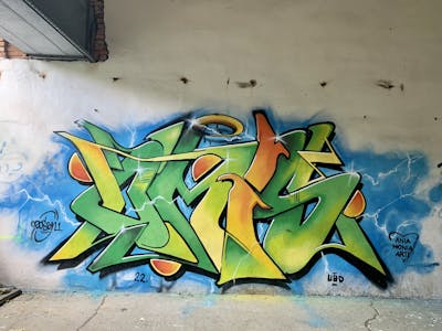 Light Green and Orange Stylewriting by Czosen1. This Graffiti is located in Warsaw, Poland and was created in 2022. This Graffiti can be described as Stylewriting and Abandoned.