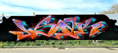 Orange and Colorful and Violet Stylewriting by Dyze and Isak. This Graffiti is located in Bern, Switzerland and was created in 2024.