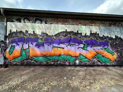 Orange and Violet and Cyan Stylewriting by Muser. This Graffiti is located in Leipzig, Germany and was created in 2024. This Graffiti can be described as Stylewriting and Wall of Fame.
