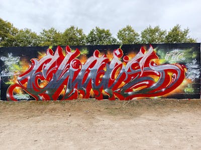 Red and Grey Stylewriting by Chais and TWC. This Graffiti is located in Talavera De La Reina, Spain and was created in 2023.