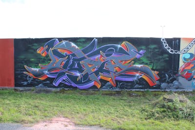Black and Orange and Violet Stylewriting by Utopia. This Graffiti is located in Germany and was created in 2022. This Graffiti can be described as Stylewriting and Wall of Fame.