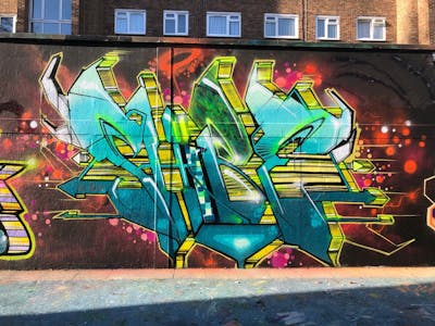 Cyan and Colorful Stylewriting by Shibe. This Graffiti is located in London, United Kingdom and was created in 2022. This Graffiti can be described as Stylewriting and Wall of Fame.