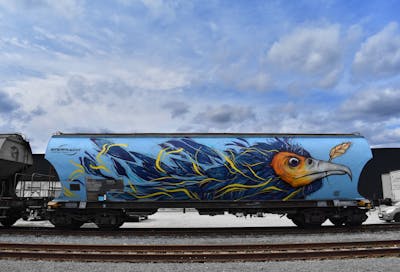 Light Blue and Colorful Characters by Dosy Doss. This Graffiti is located in Olomouc, Czech Republic and was created in 2021. This Graffiti can be described as Characters and Trains.