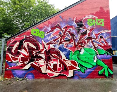 Red and Light Green Stylewriting by SmakOne and Opus. This Graffiti is located in hanover, Germany and was created in 2022. This Graffiti can be described as Stylewriting and Characters.