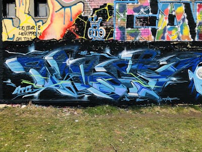 Light Blue and Blue Stylewriting by WOOKY. This Graffiti is located in Leipzig, Germany and was created in 2022. This Graffiti can be described as Stylewriting and Wall of Fame.