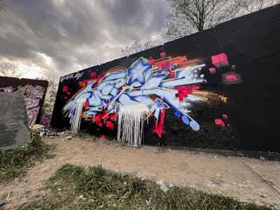Light Blue and Red Stylewriting by ARIK. This Graffiti is located in Germany and was created in 2022. This Graffiti can be described as Stylewriting and Wall of Fame.