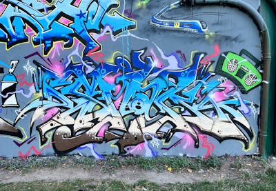Light Blue and Colorful Stylewriting by SmakOne. This Graffiti is located in hanover, Germany and was created in 2022. This Graffiti can be described as Stylewriting, Characters and Wall of Fame.