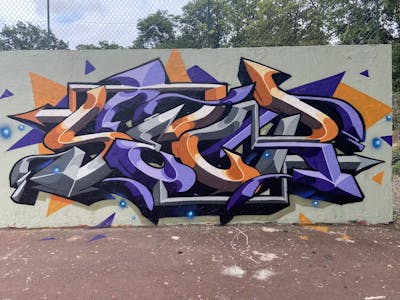Orange and Violet and Grey Stylewriting by Secr. This Graffiti is located in Paris, France and was created in 2023. This Graffiti can be described as Stylewriting and Wall of Fame.