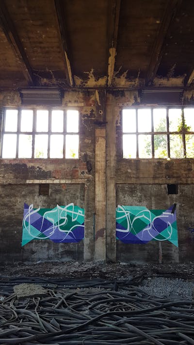 Colorful and Green Handstyles by urine and OST. This Graffiti is located in Köthen, Germany and was created in 2018. This Graffiti can be described as Handstyles, Futuristic and Abandoned.