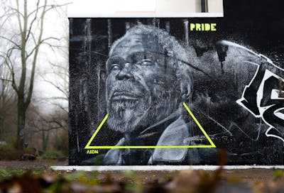Grey and Black Characters by AIDN. This Graffiti is located in Berlin, Germany and was created in 2020. This Graffiti can be described as Characters and Wall of Fame.
